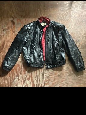 Ada Black Leather Jacket with Red Interior Lining